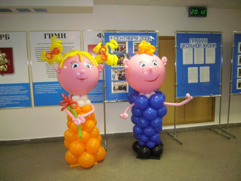Мальчик и девочка из шаров фото
